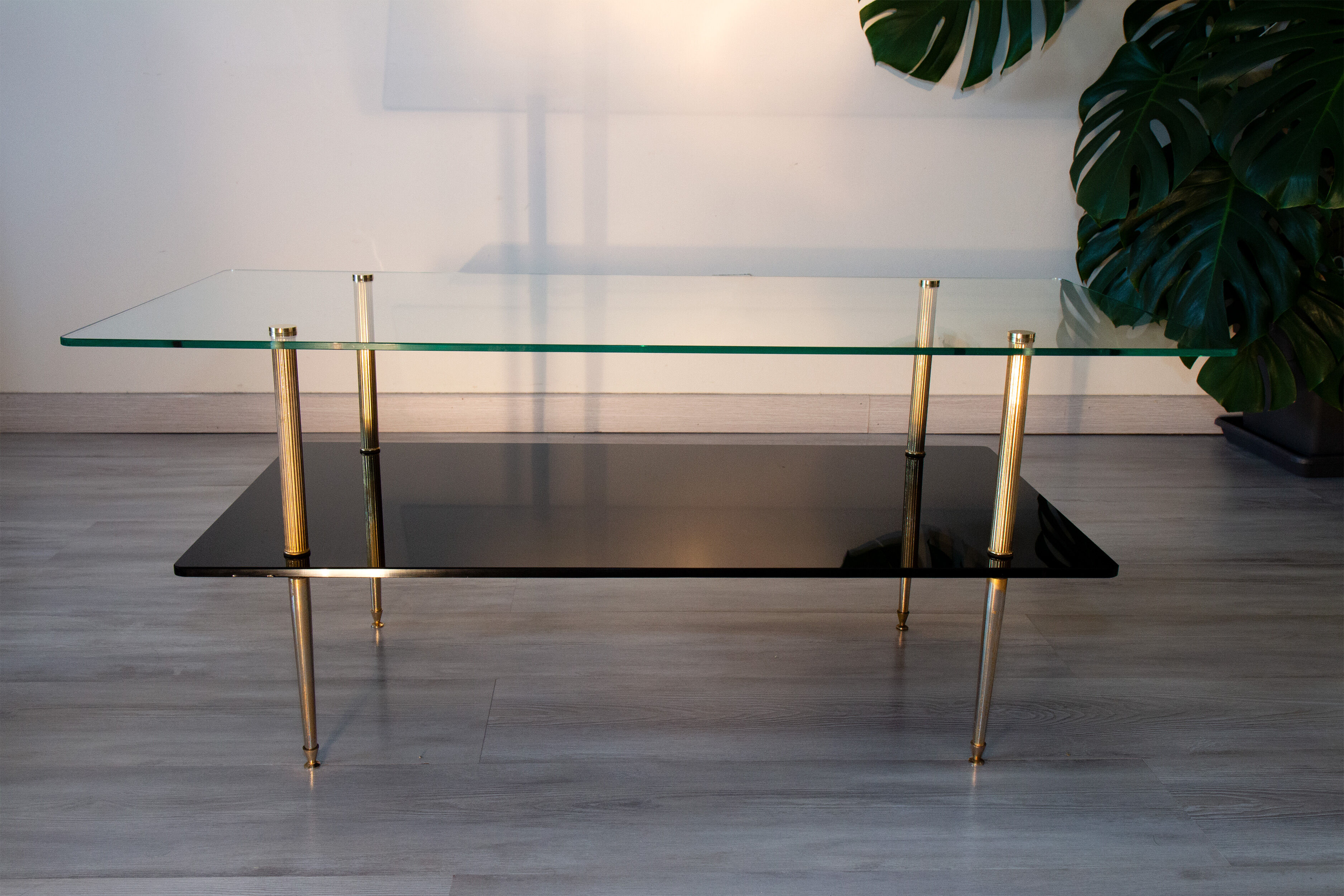 Double coffee table top of glass and gilded metal, 1950