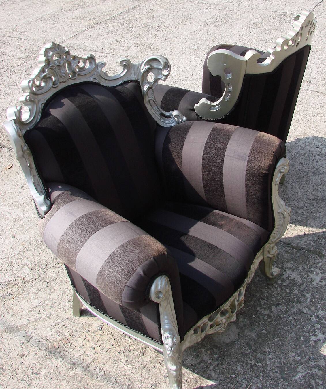 A pair of vintage armchairs, 1980s, lacquered wood and fabric