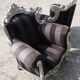 A pair of vintage armchairs, 1980s, lacquered wood and fabric