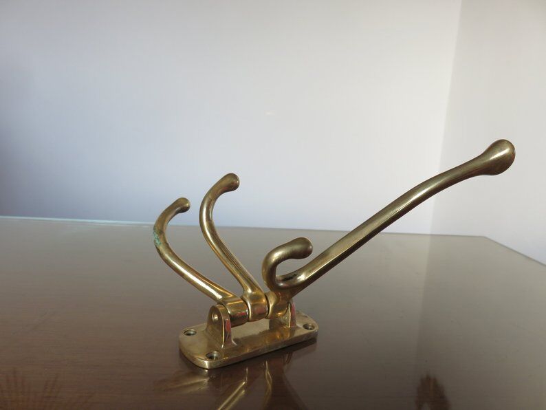 Coatrack swivel brass 70s