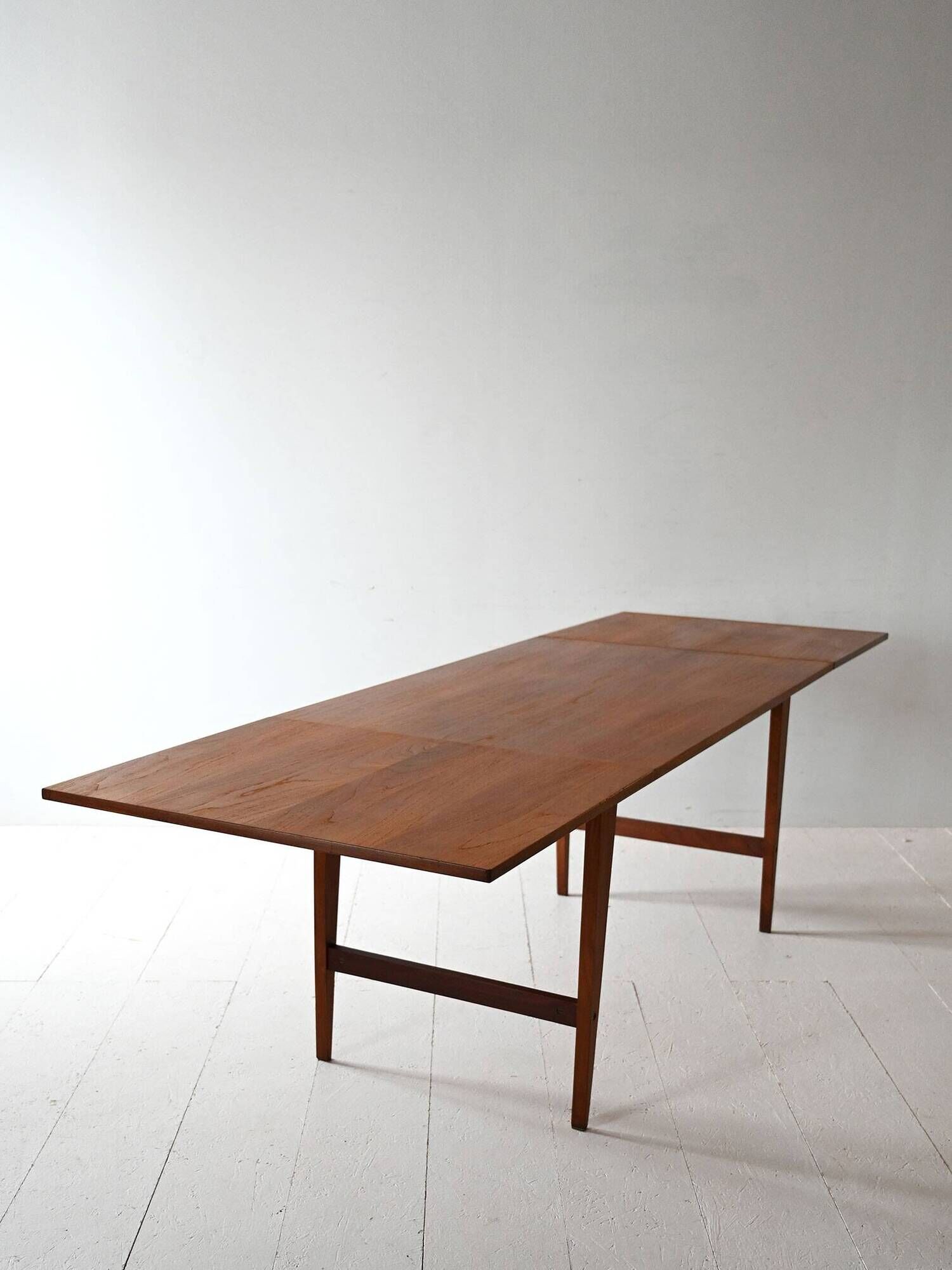 Vintage teak table by ISA Bergamo with drop-leaf extensions