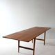 Vintage teak table by ISA Bergamo with drop-leaf extensions
