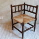 Fauteuil de coin paillé