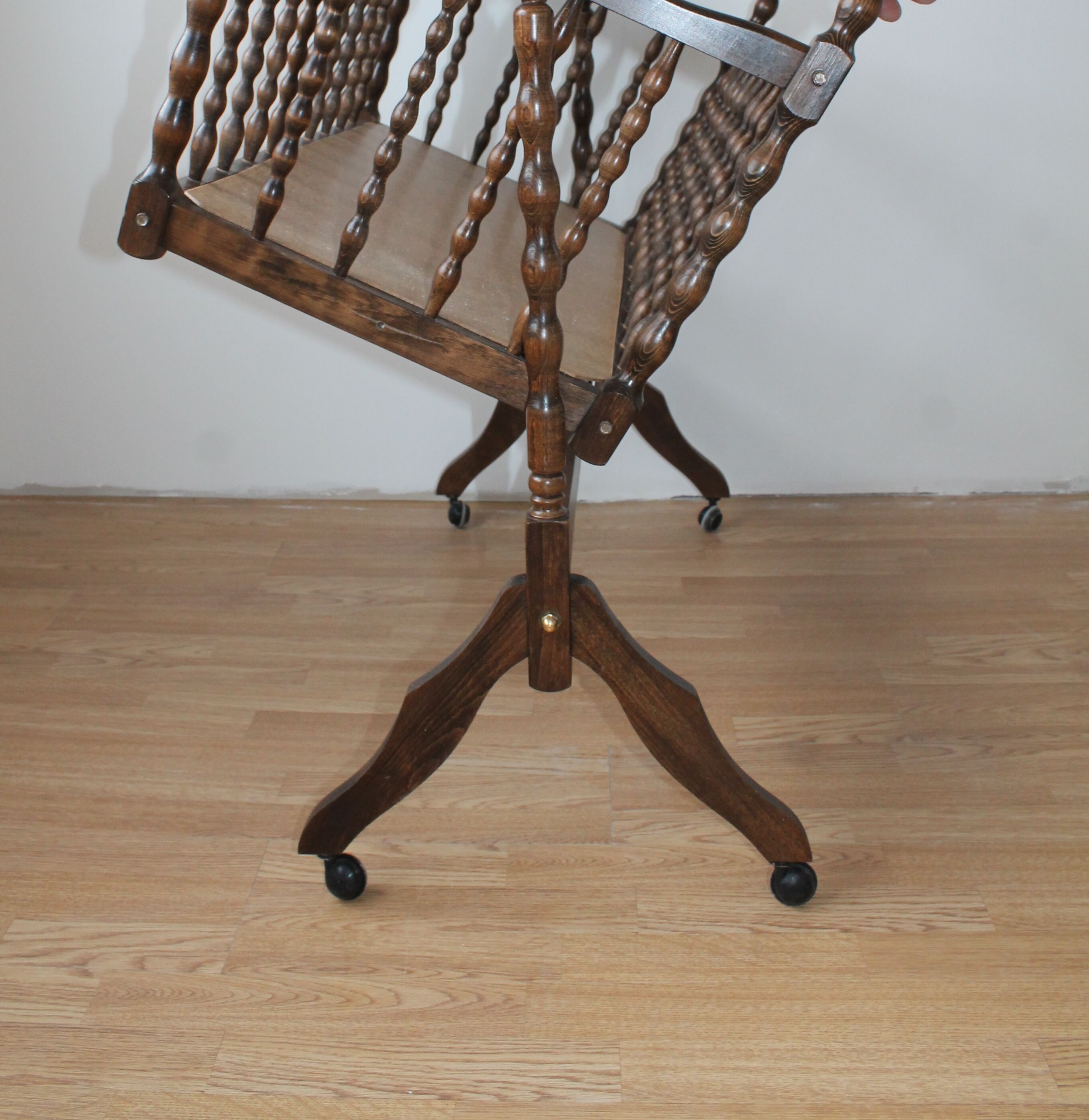 Old Vintage cradle with balance on wheels