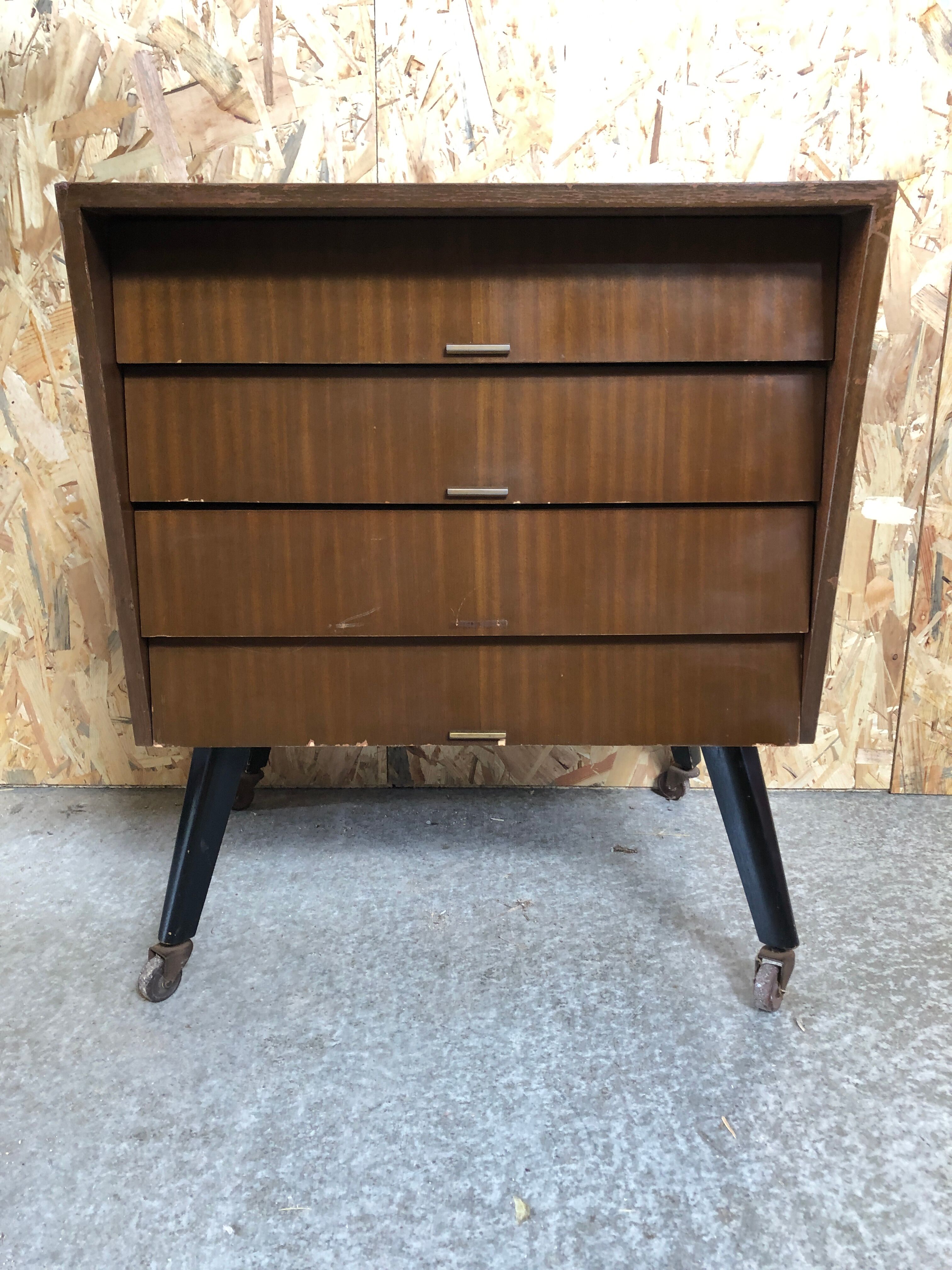 Old chest of drawers 4 drawers wood feet compass black + castors 70s vintage