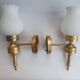 Three Empire style golden torch wall sconces