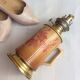 Oil lamp with ceramic body handle