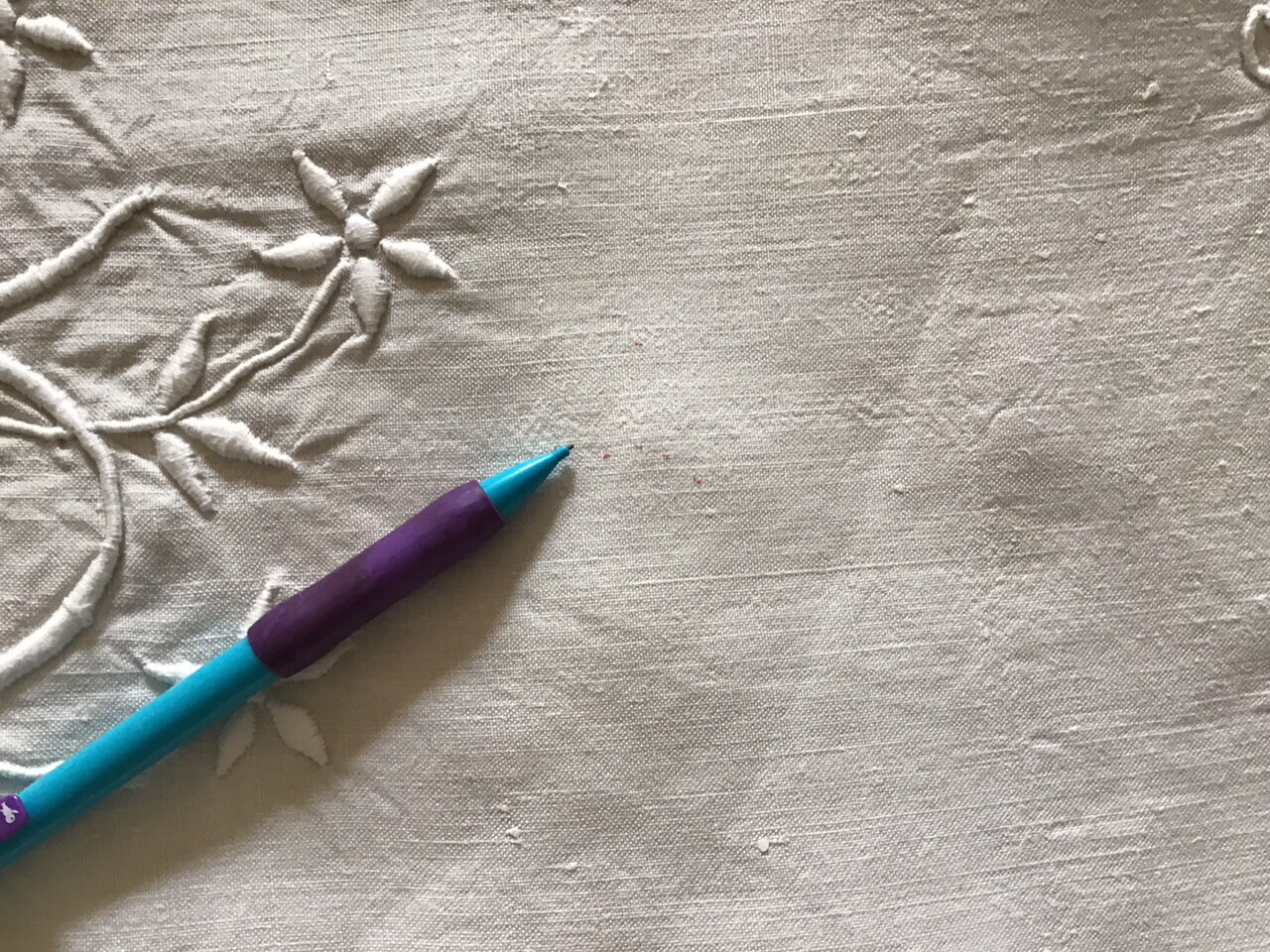 Embroidered linen sheet marked "JP"