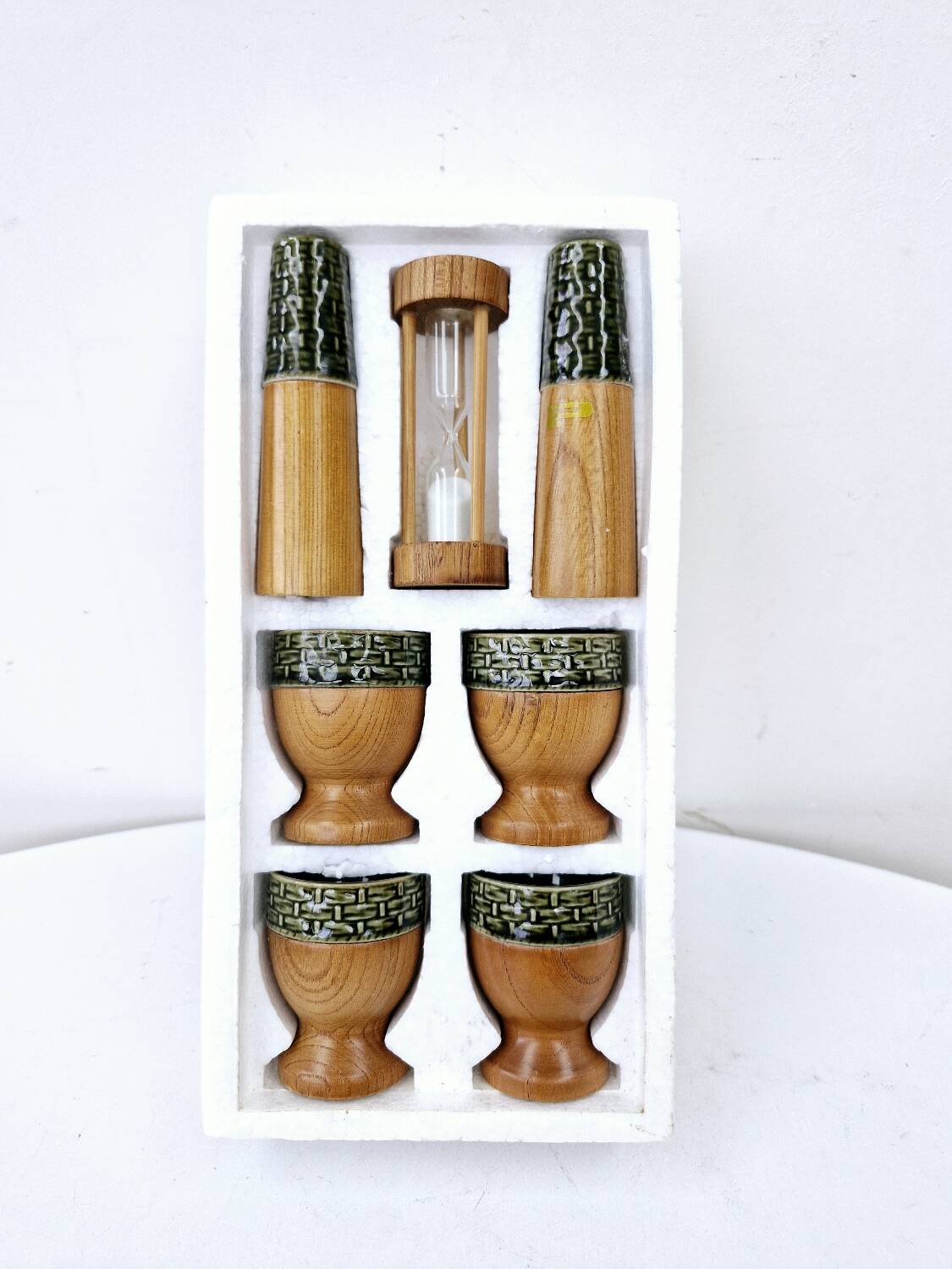 Set of 4 egg cups, salt shakers, pepper shakers and vintage wood and ceramic timer