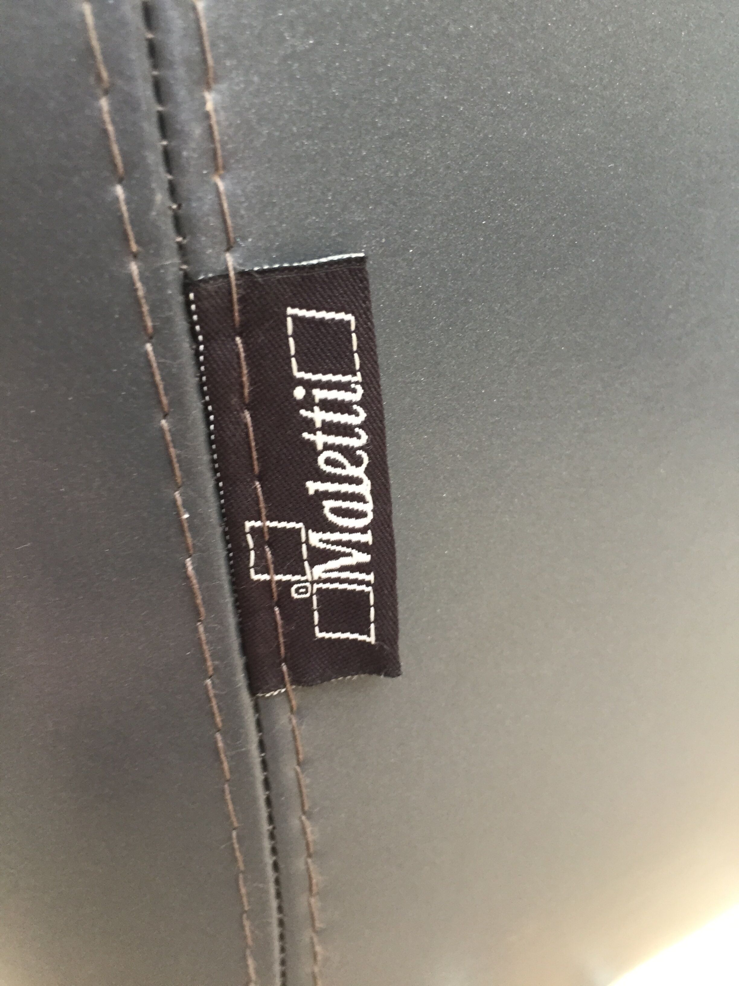 Fauteuil en skai Maletti