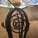 antique wrought iron lamp, 1900 to 1930 with stained glass lampshade soldered with lead