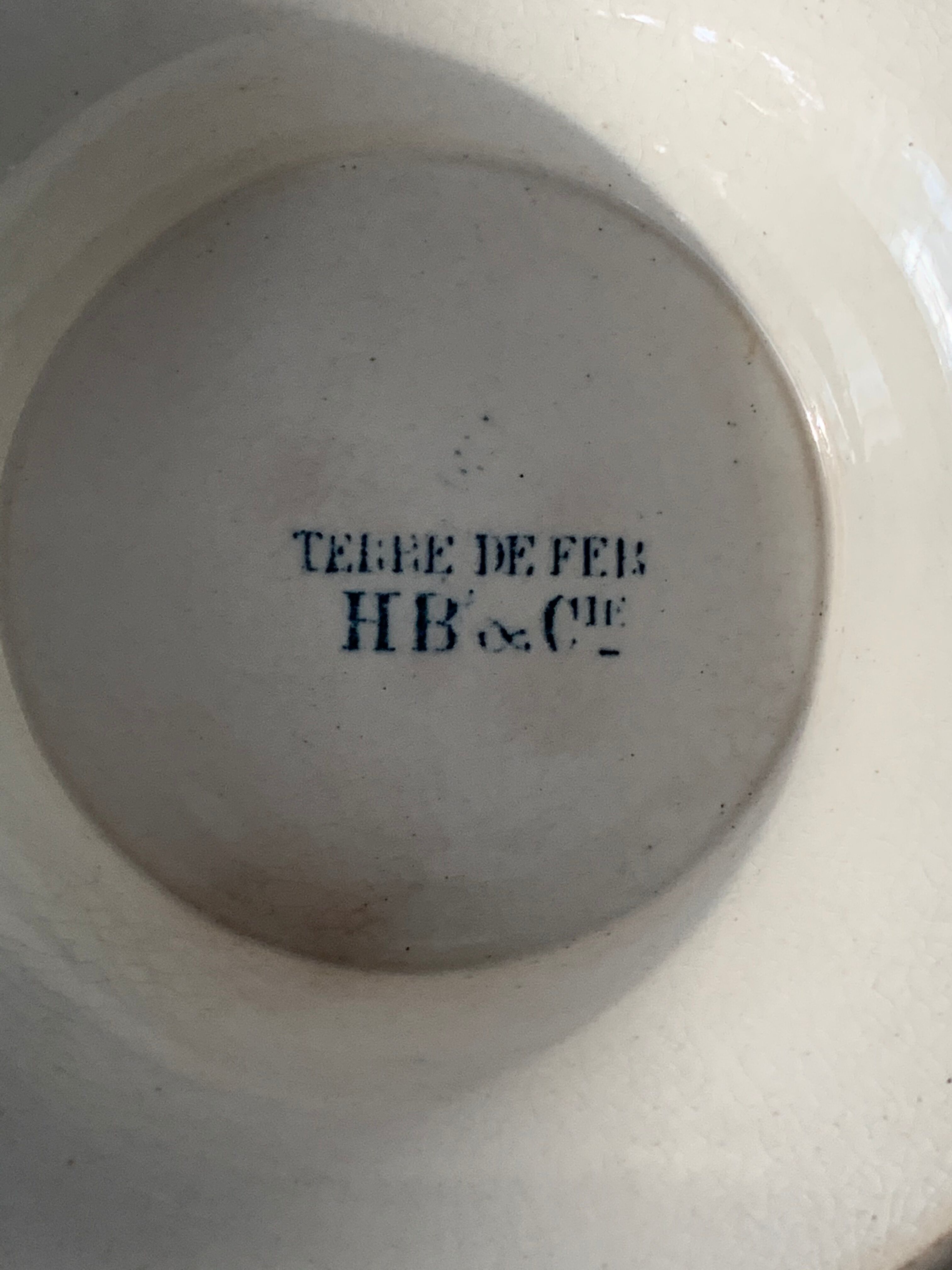 8 plates and an old compoter Terre de Fer HB and Co.
