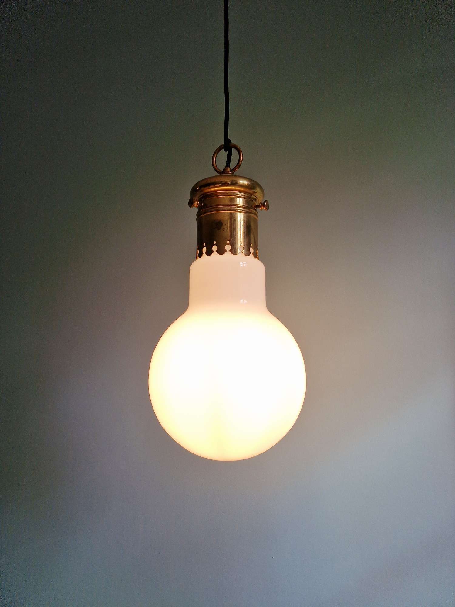Large bulbous pendant light in white opaline and brass, 1960s.