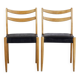 Pair of Scandinavian chairs in teak and faux leather, 1960.