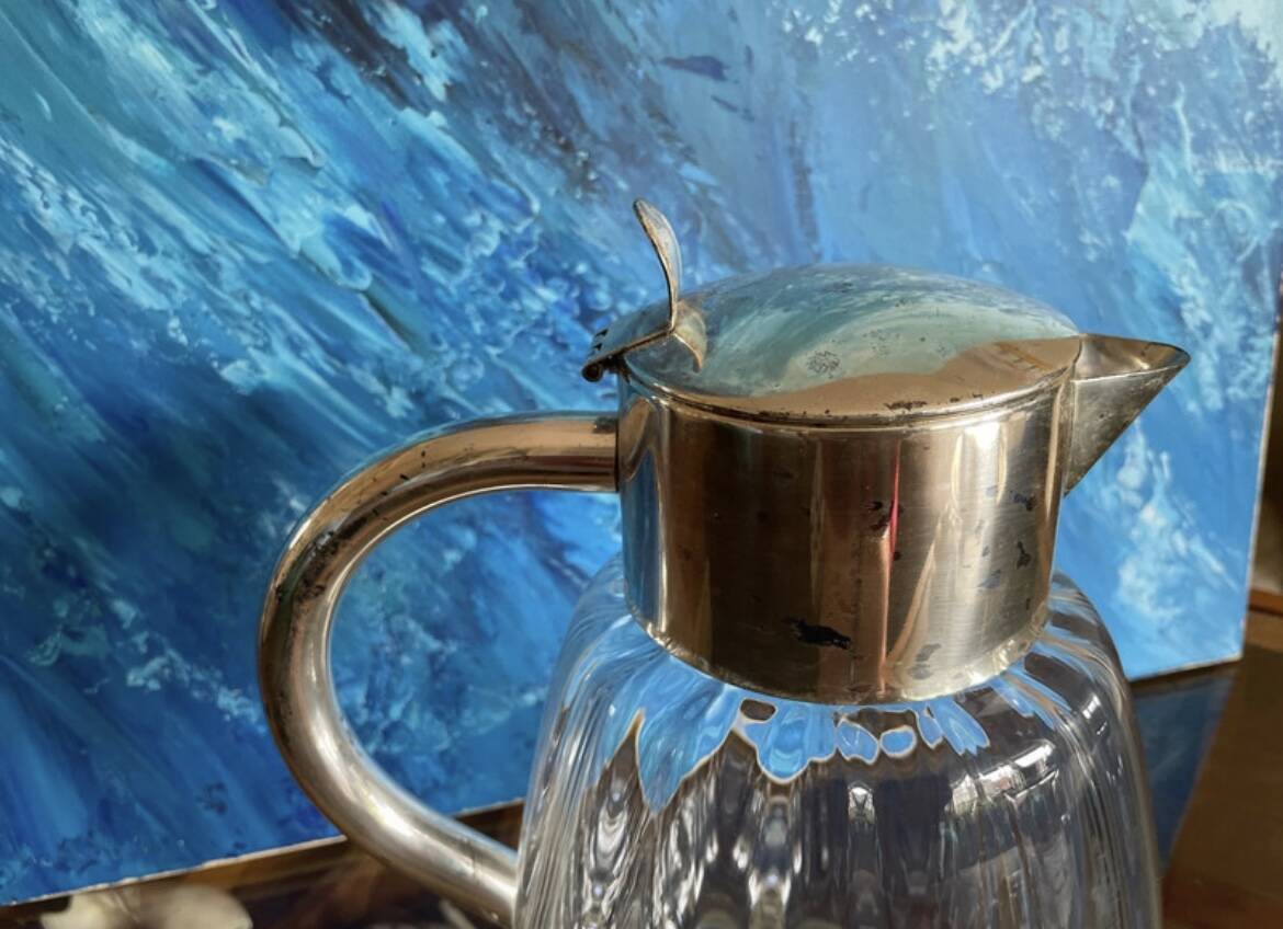 Antique pitcher with ice cooler tube