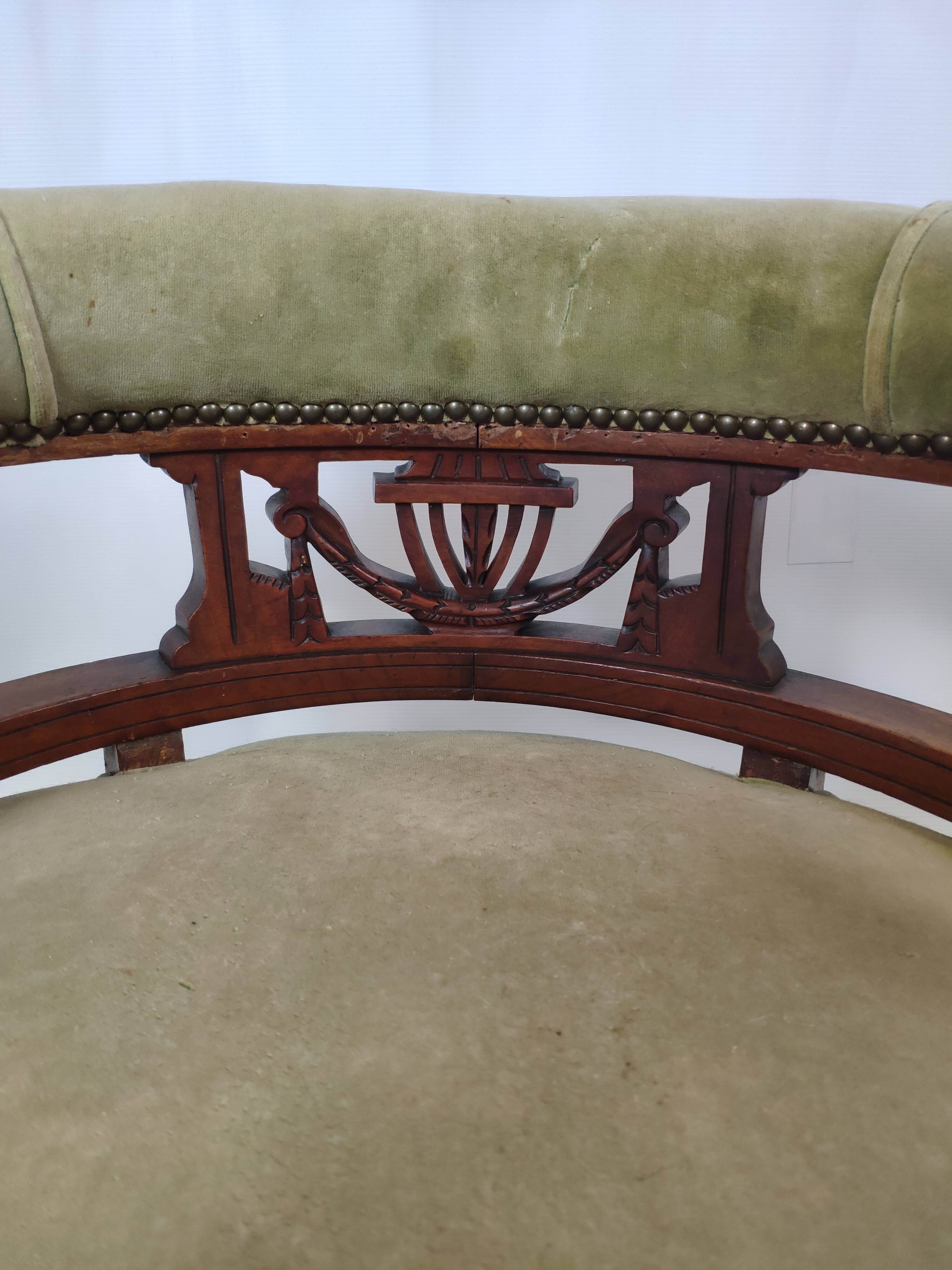 Old green velvet empire chair