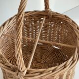 Basket with vintage rattan bottles