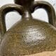 Varnished terracotta oil jar