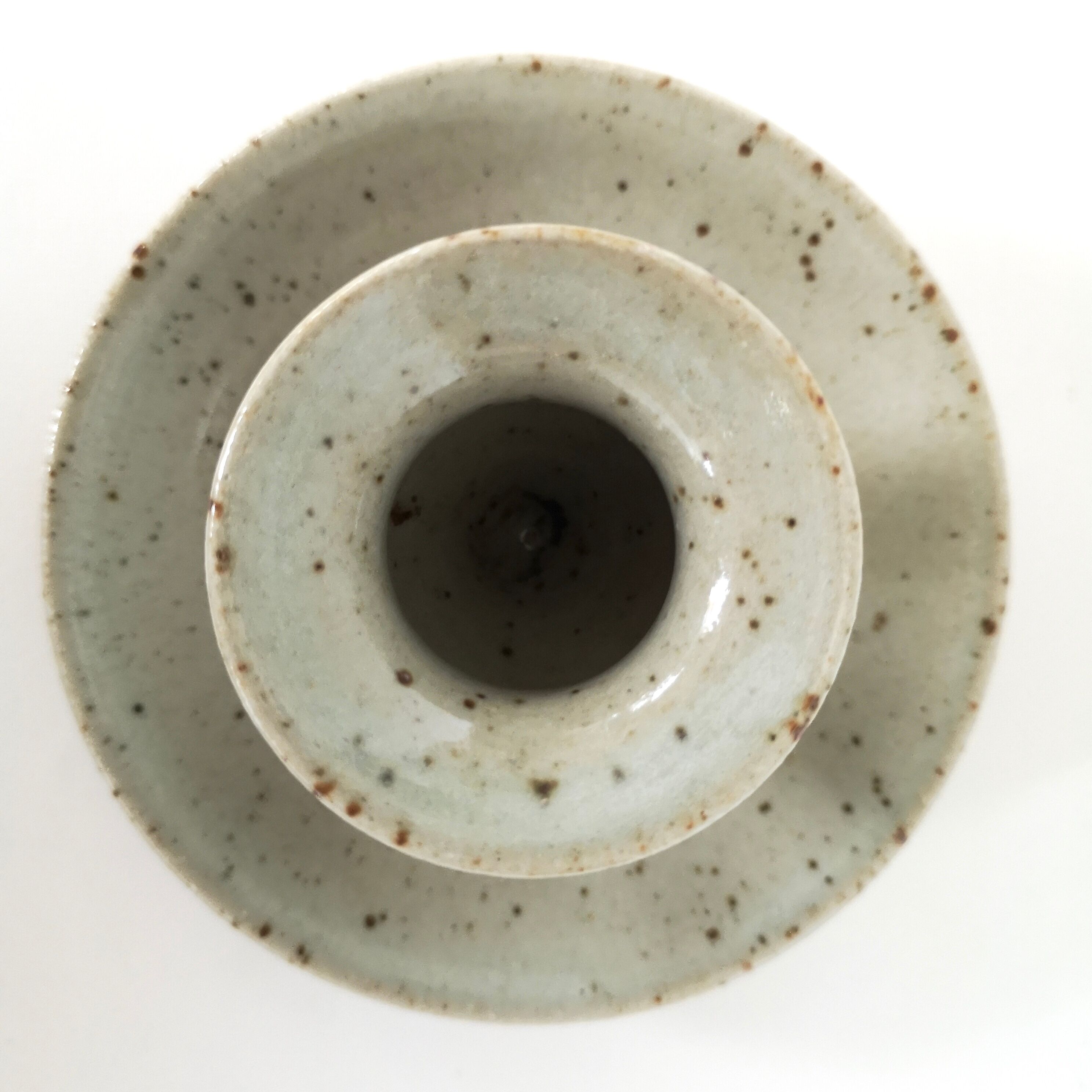 Enamelled sandstone candlestick