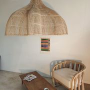Huge rattan suspension in the shape of a corolla H:1m; D: 1m50