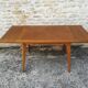 Oak table has two vintage extensions