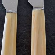 Philos - Set of 12 stainless steel dessert knives with bakelite handles.