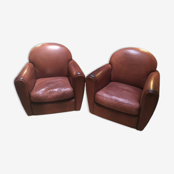 Pair of art deco club armchairs in leather