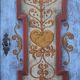 Wedding wardrobe painted in rustic farmhouse folk art