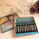 Box of 12 vintage fruit cocktail snail forks