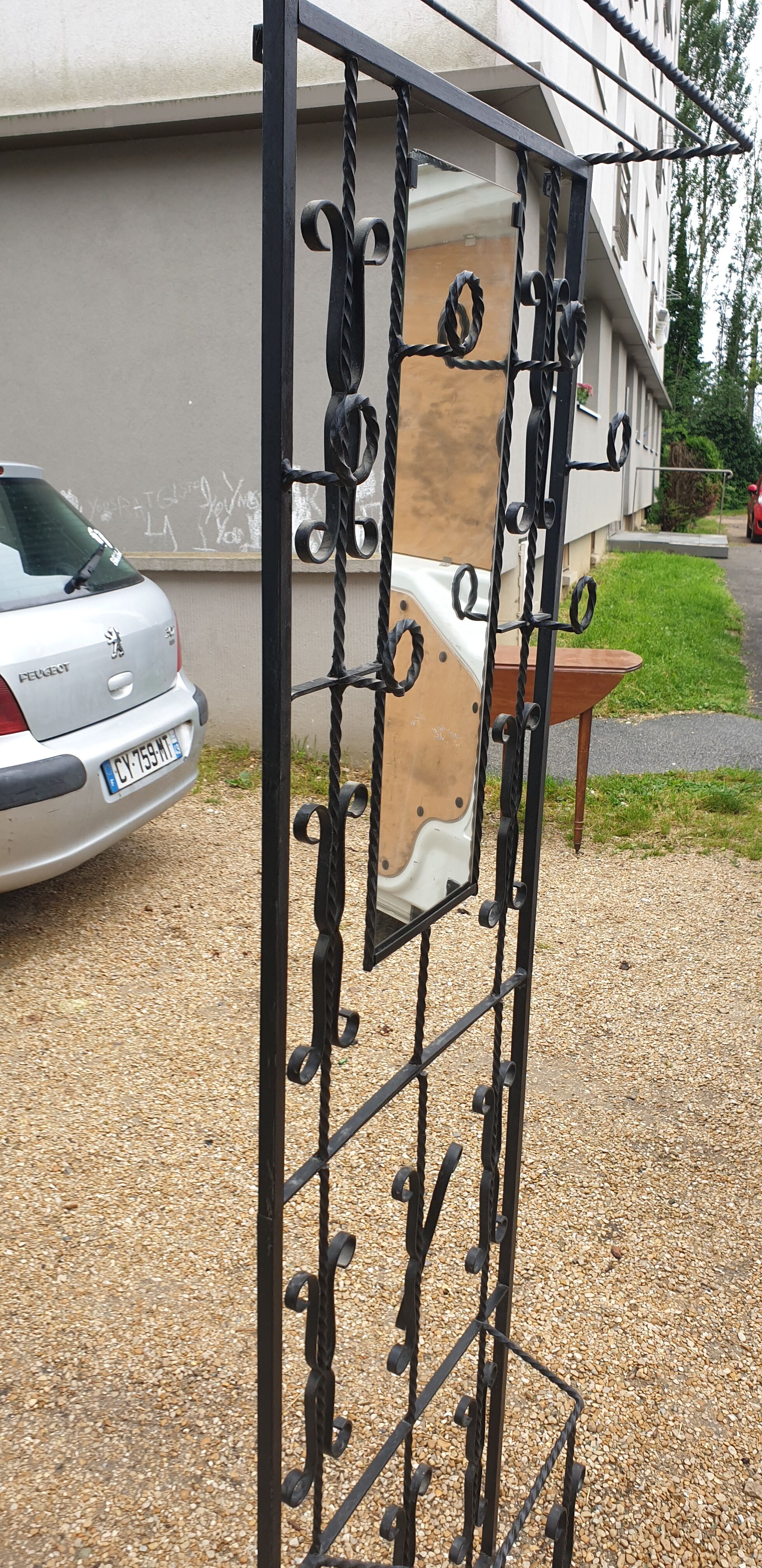 Wrought iron coat holder