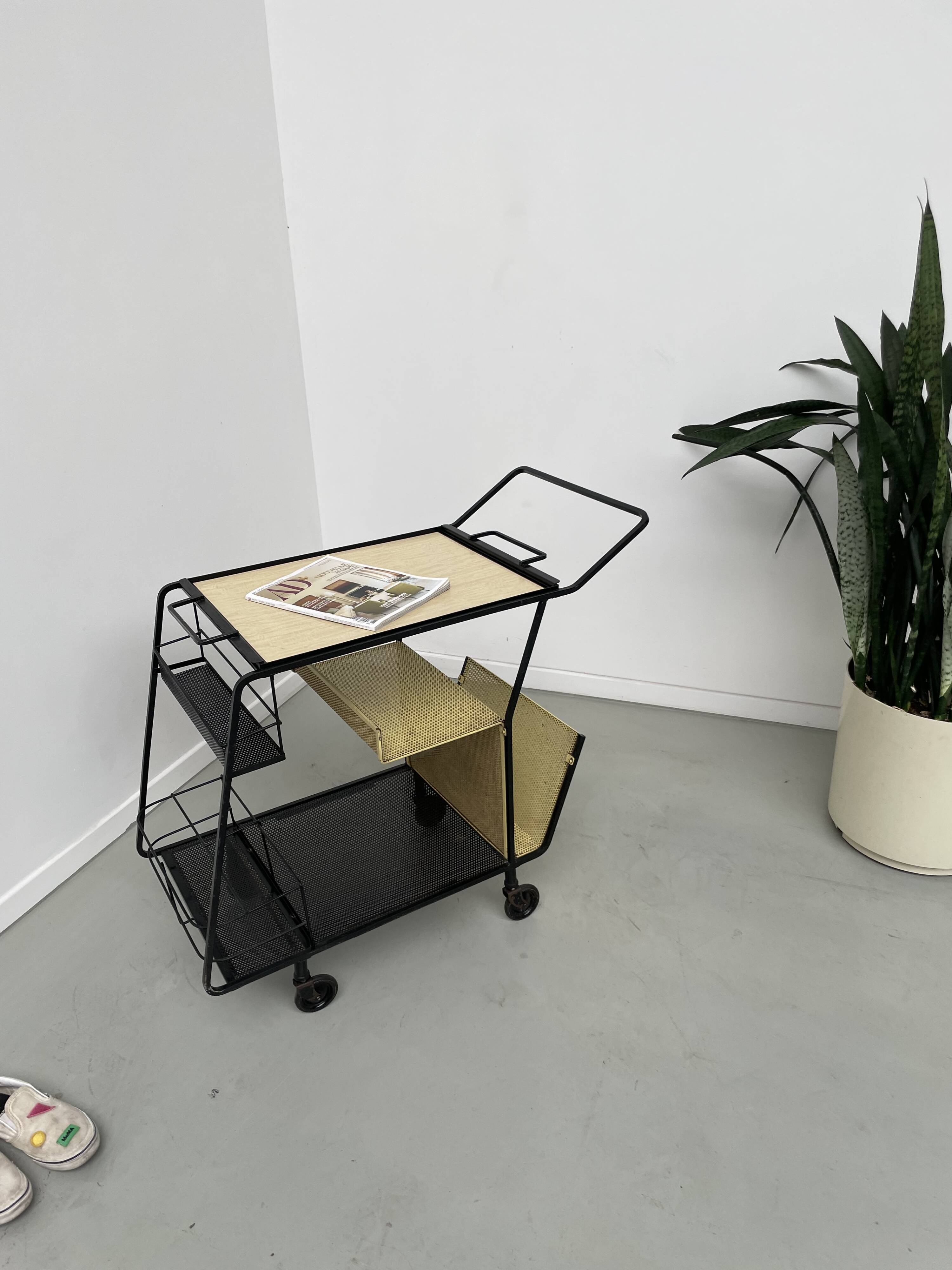 Perforated metal serving trolley in the Mathieu Matégot style