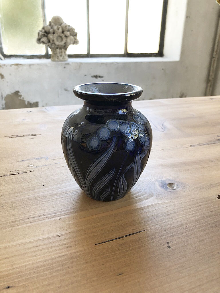 Artisan vase with floral motifs