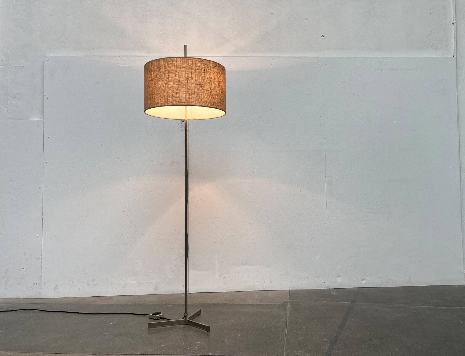 Minimalist German tripod floor lamp from the mid-century, 1960s.