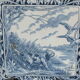 Old tile in Gien earthenware decoration hunting dog