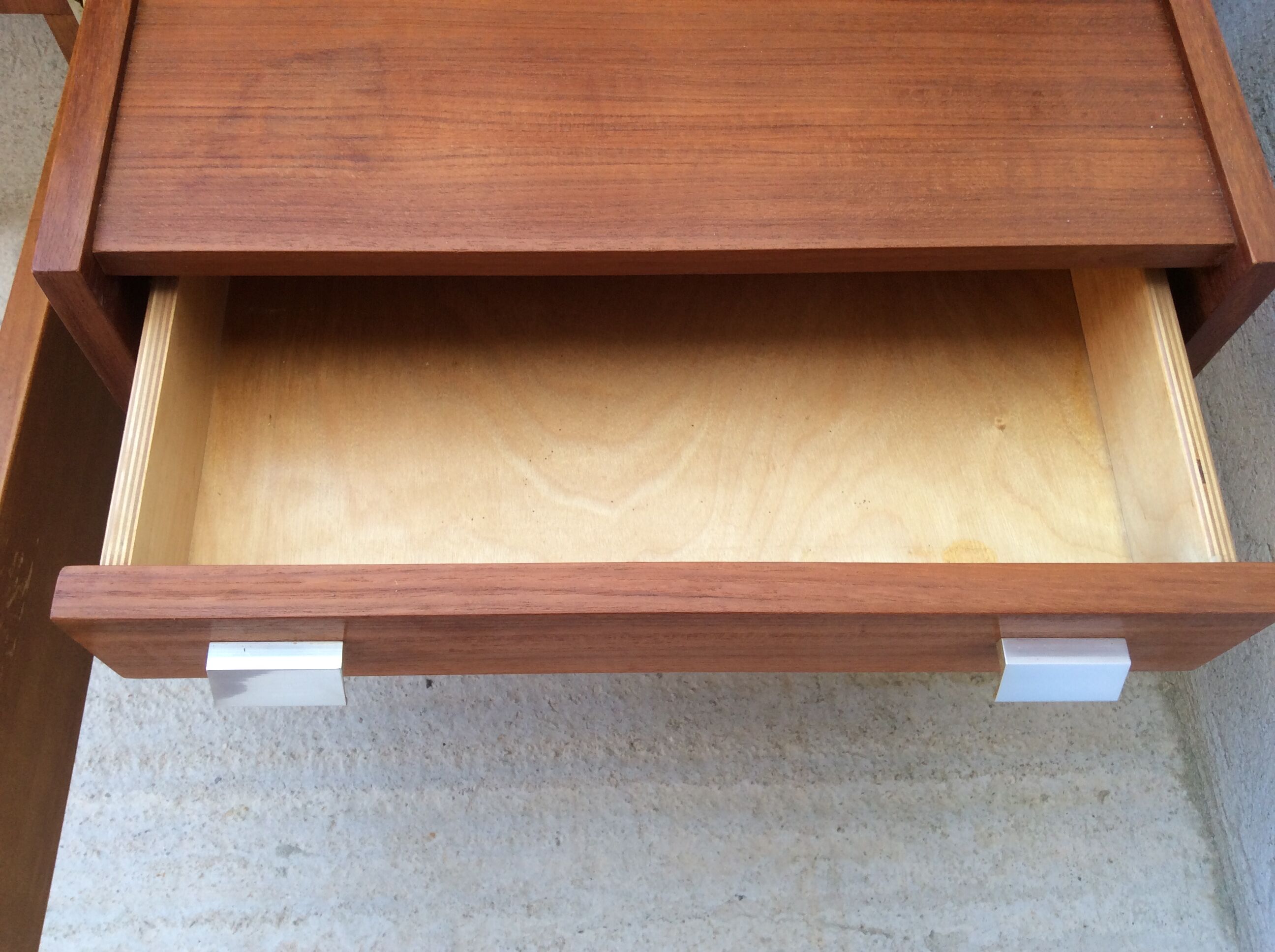 Scandinavian-style teak bed with integrated nightstands