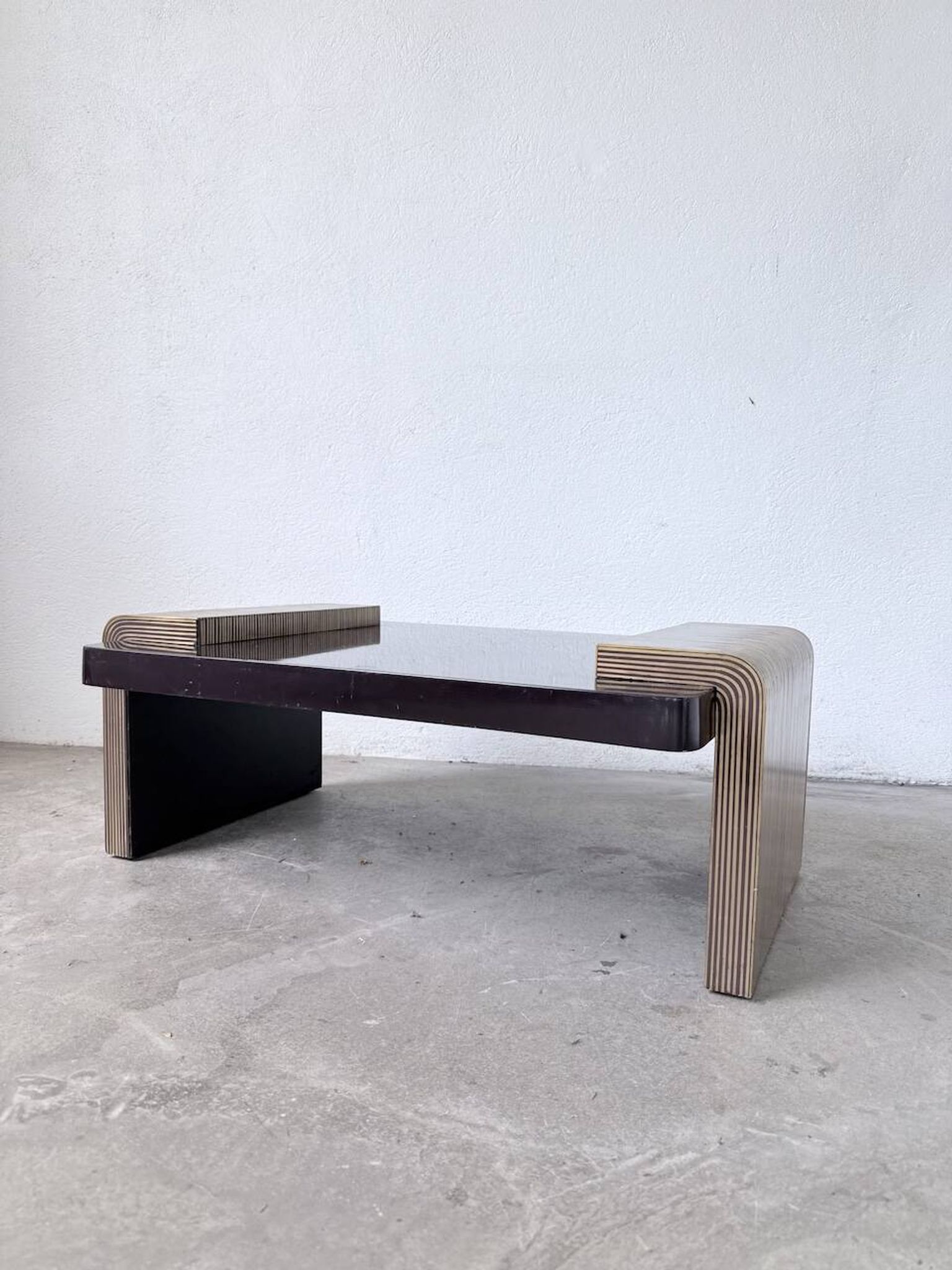 Art Deco coffee table in lacquer and brass