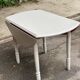 Louis Philippe round dining table with folding shutters repainted in beige grey