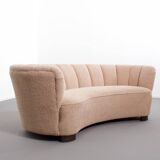 Danish curved banana sofa in a powder pink wool fabric, 1940s