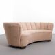 Danish curved banana sofa in a powder pink wool fabric, 1940s