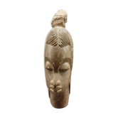 Bust of an African woman in mbigou stone