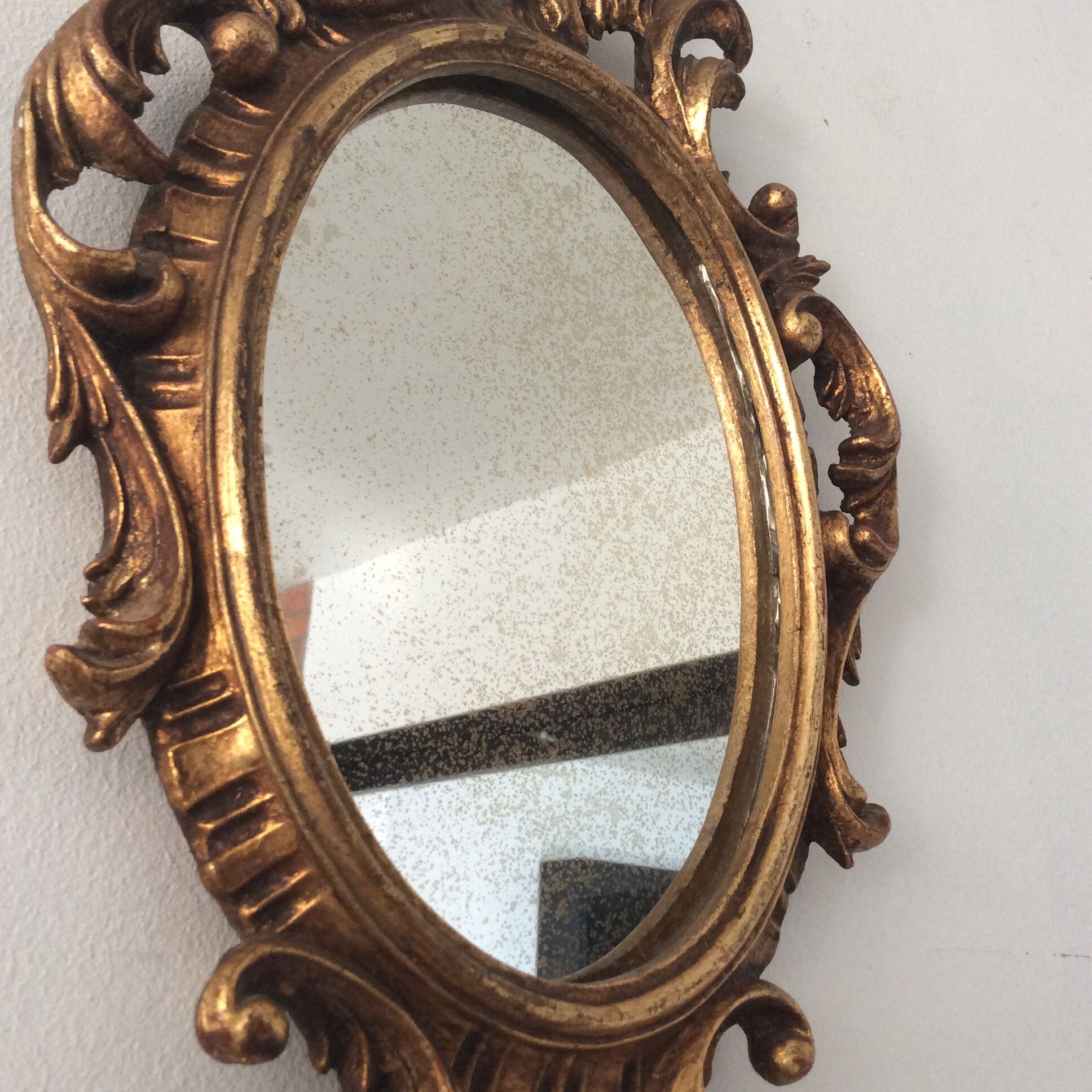 Old mirror in gilded wood 17x12cm