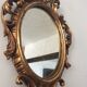 Old mirror in gilded wood 17x12cm