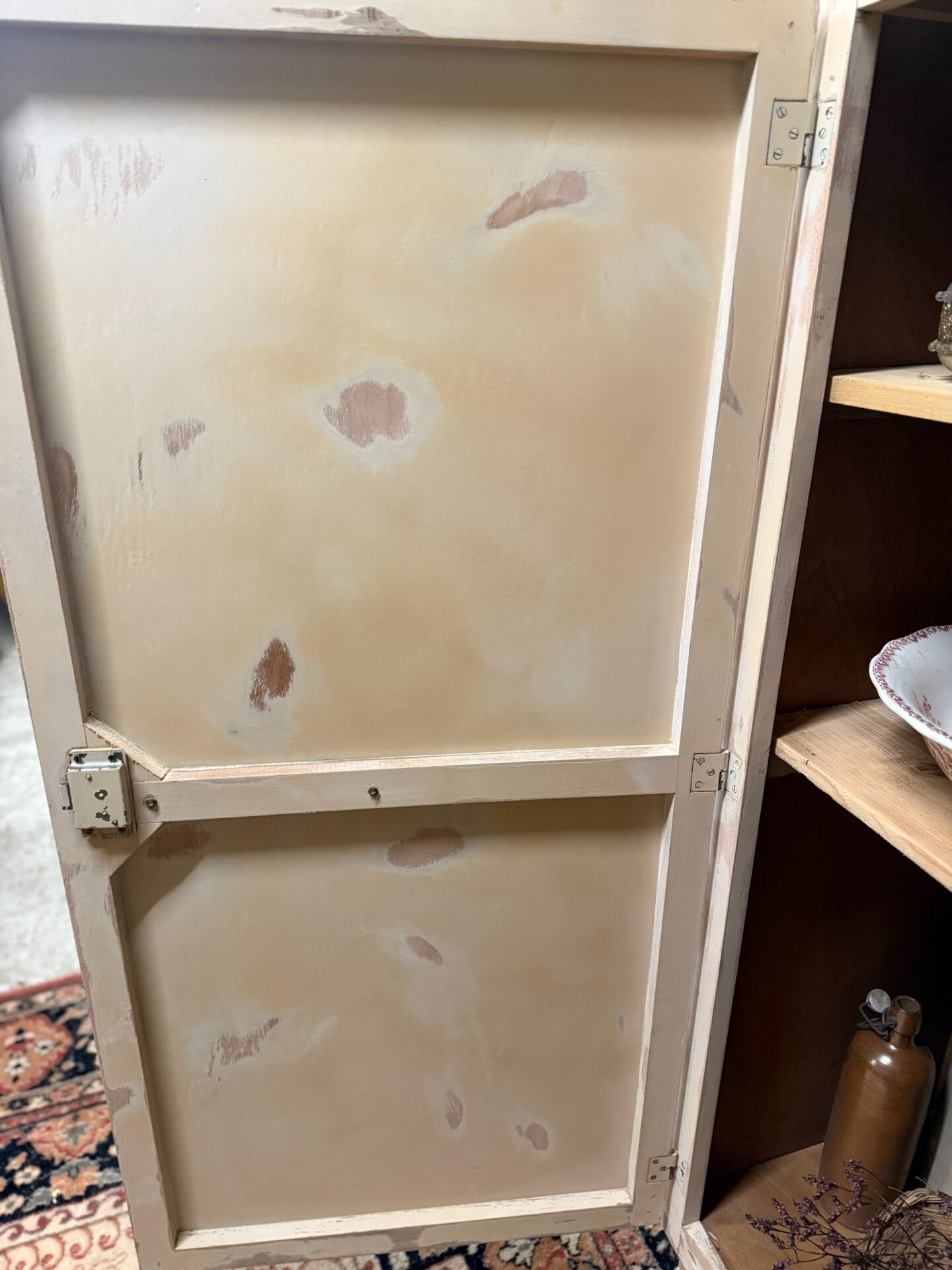 Small one-door Art Deco cabinet with a patina.