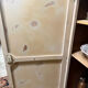 Small one-door Art Deco cabinet with a patina.
