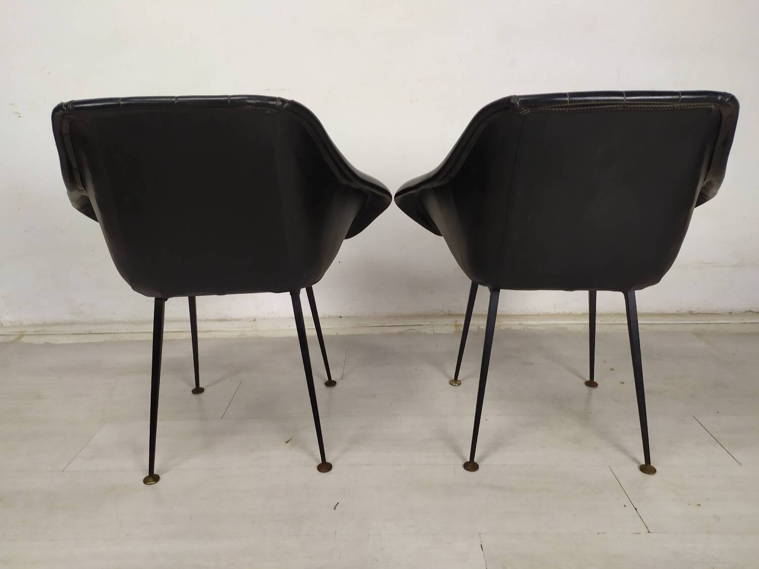 Vintage black skai armchairs