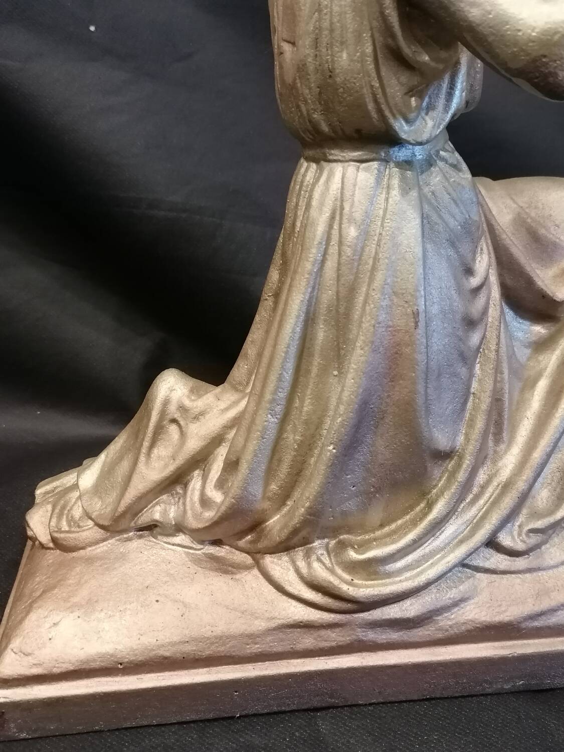 Statuette of a woman in gilded cast iron (Joan of Arc?)