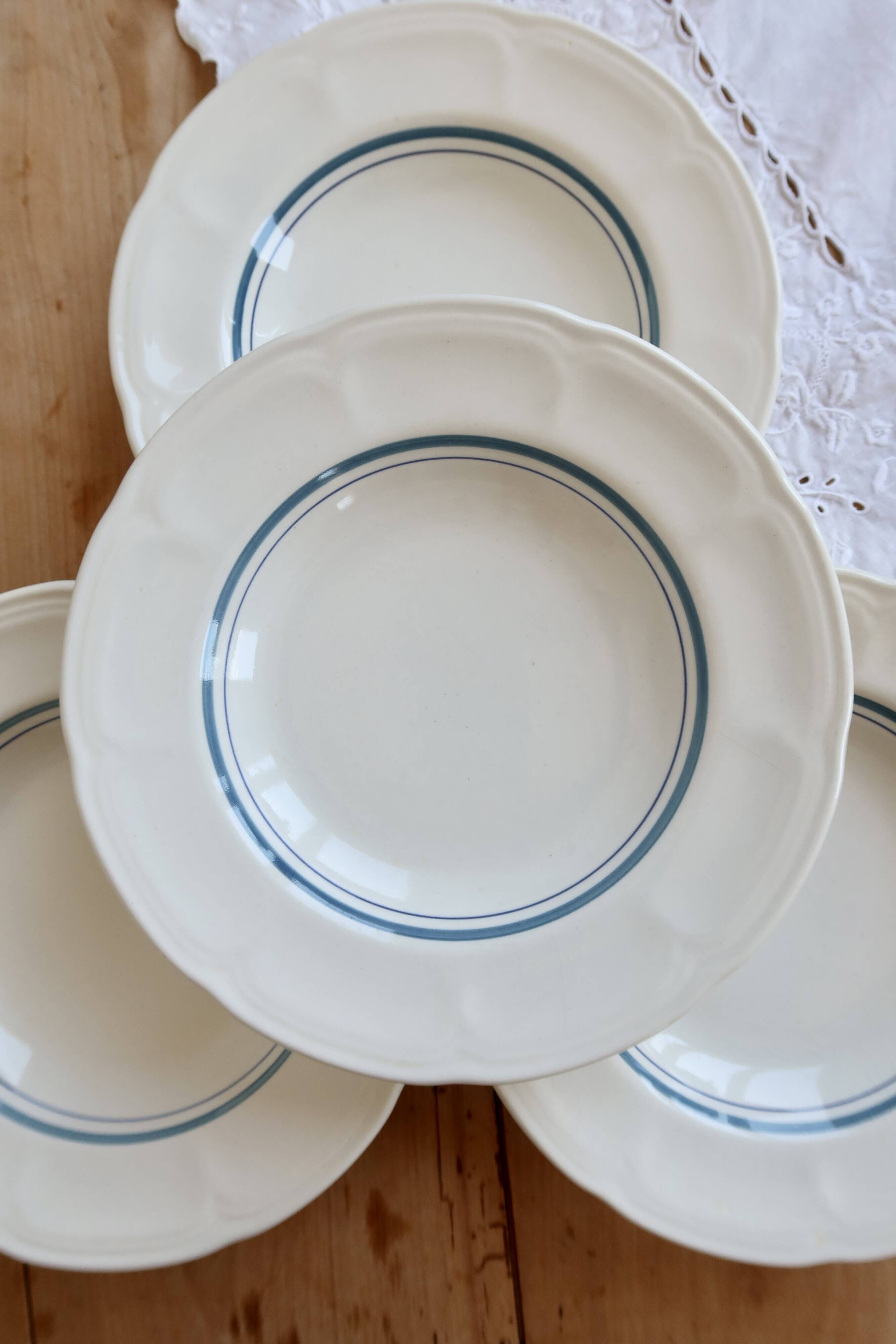 4 vintage ivory earthenware deep plates – double blue borders