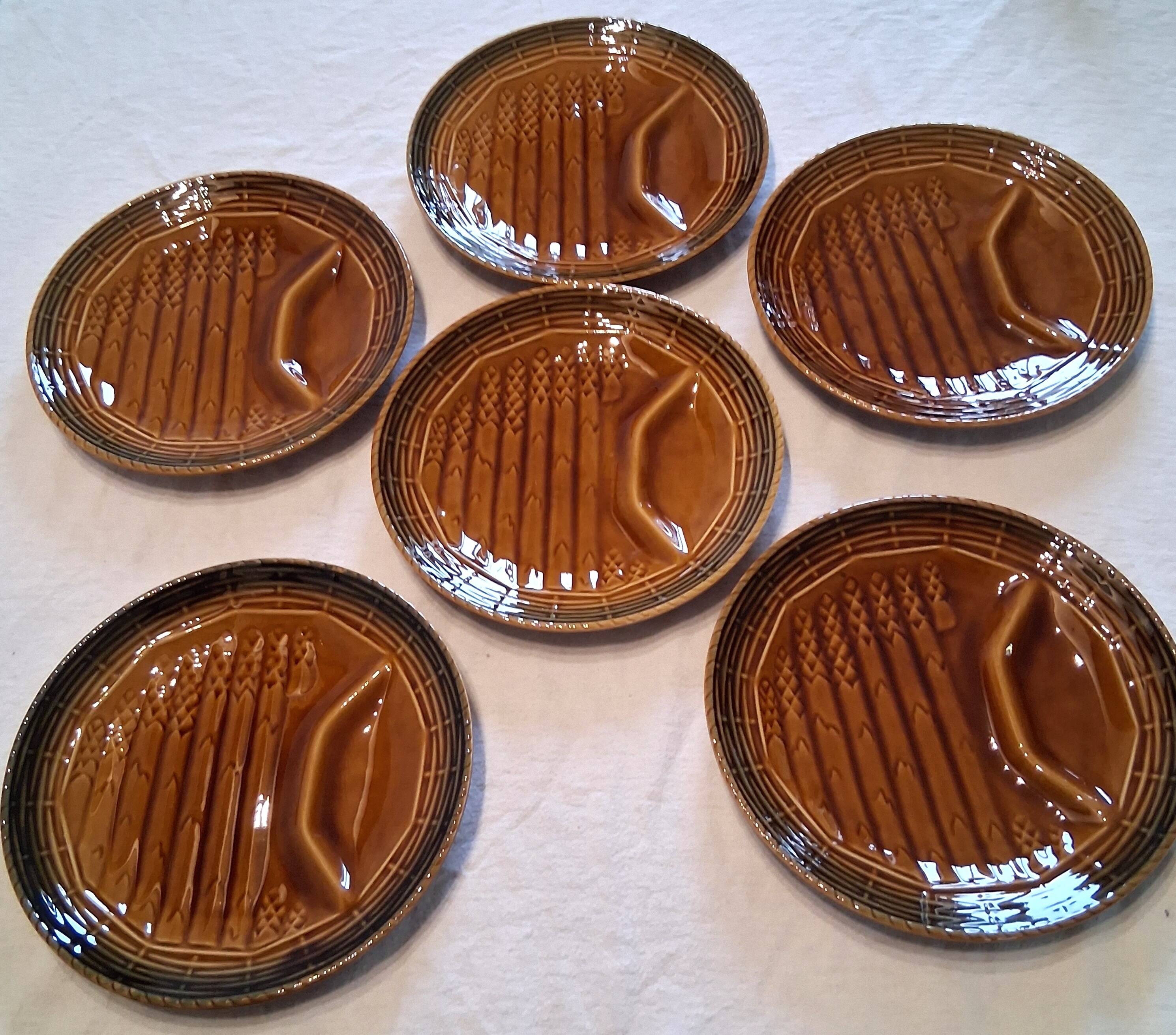6 asparagus plates stamped "Sarreguemines" on the back in very good condition.