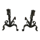 Pair of ironwork andirons in the style of Raymond Subes, circa 1940