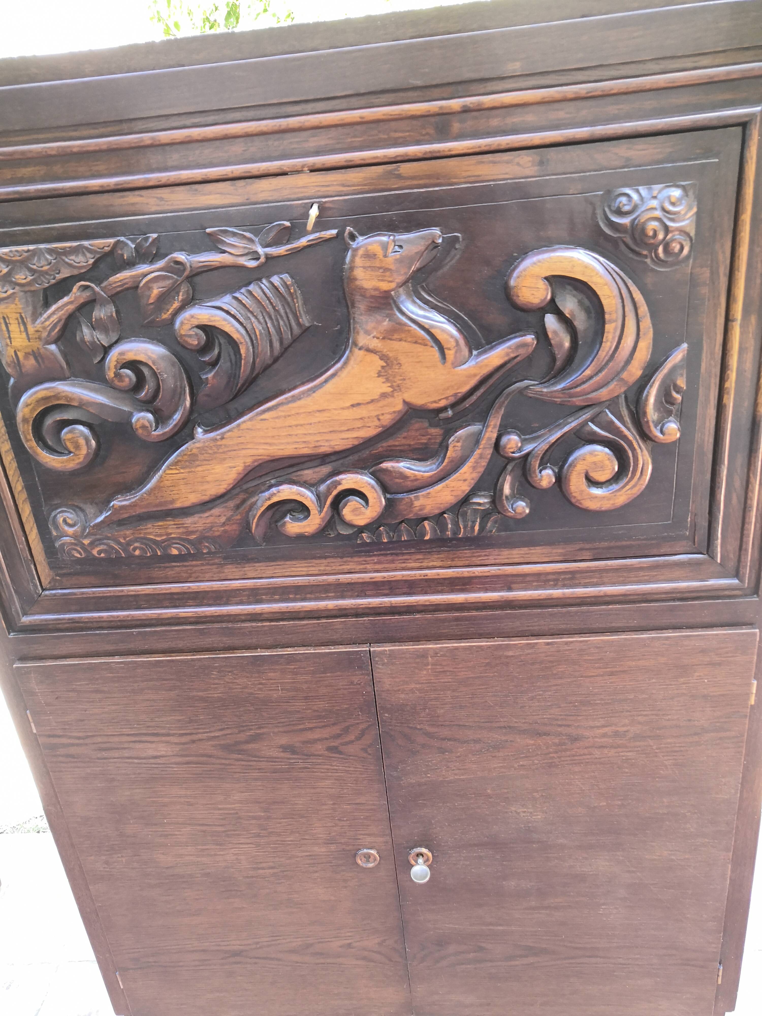 Vintage Art Deco carved bar cabinet